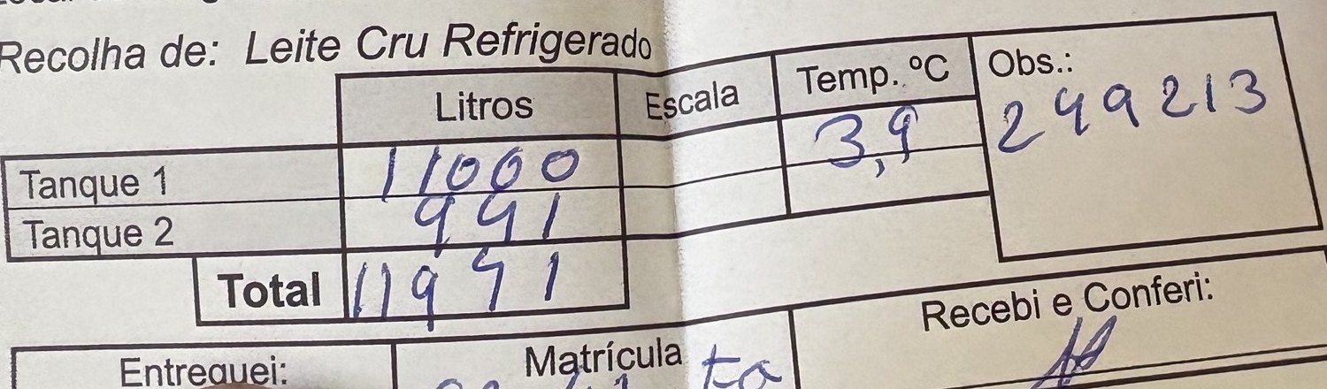 Talão de recolha preenchido à mão: Tanque 1 mil litros, Tanque 2 novecentos e noventa e um, total mil novecentos e noventa e um litros, temperatura 3,9 graus.
